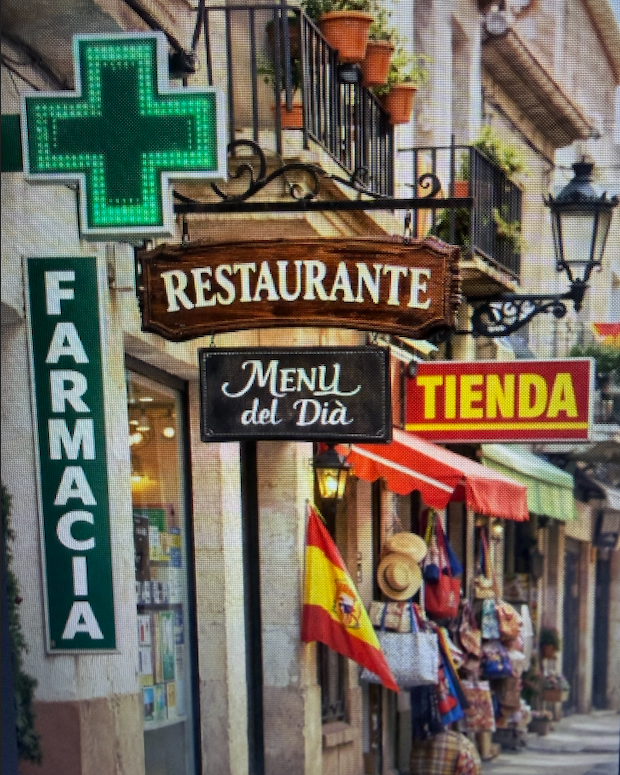 Spanish street scene with Farmacia, Restaurante, and Tienda signs